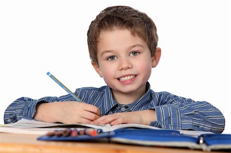 simsearch:400-04123384,k - cute young boy learning with white background Photographie de stock - Aubaine LD & Abonnement, Code: 400-04869281
