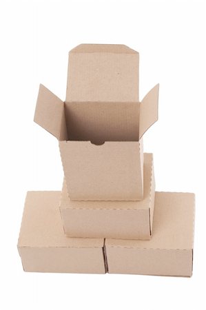 simsearch:400-04306840,k - Brown cardboard boxes arranged in stack on white background Fotografie stock - Microstock e Abbonamento, Codice: 400-04869593