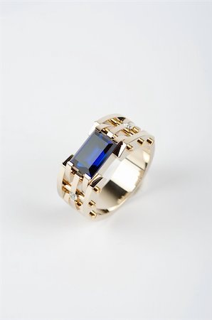 simsearch:649-09207278,k - gold ring with big blue gem and smaller diamonds Stockbilder - Microstock & Abonnement, Bildnummer: 400-04869946