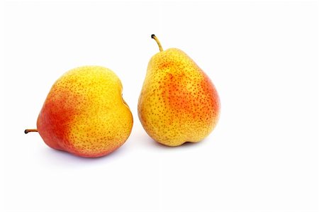 simsearch:400-04402673,k - Ripe pears isolated on white background. Fotografie stock - Microstock e Abbonamento, Codice: 400-04869994