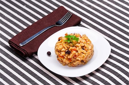 delicious couscous with chicken on a striped background Stock Photo - Budget Royalty-Free & Subscription, Code: 400-04860429