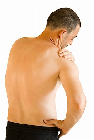 simsearch:400-06690149,k - young man having neck and shoulder ache making massage Stock Photo - Budget Royalty-Free & Subscription, Code: 400-04860584