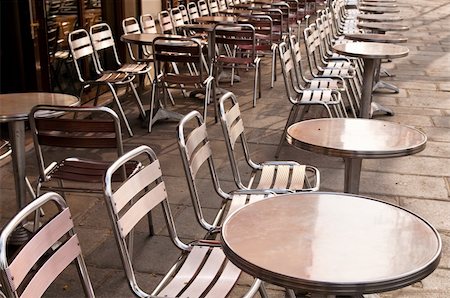 Street view of a Cafe terrace with empty tables and chairs,paris France Stock Photo - Budget Royalty-Free & Subscription, Code: 400-04860703