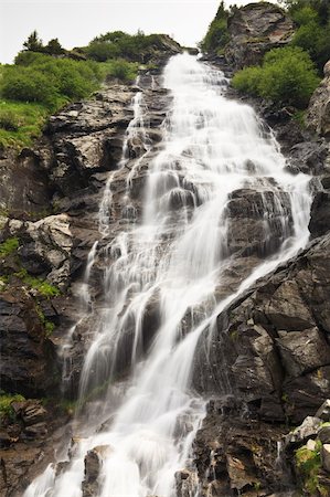 simsearch:400-04904211,k - a beautiful waterfall on a mountain slope Fotografie stock - Microstock e Abbonamento, Codice: 400-04860885