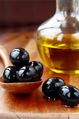 simsearch:400-05666507,k - black olives and Olive Oil on an old tablel Stock Photo - Budget Royalty-Free & Subscription, Code: 400-04860939