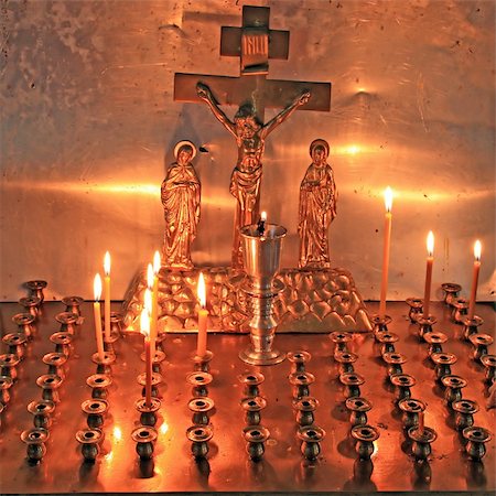 prayer candle and cross - candles in christian church Stock Photo - Budget Royalty-Free & Subscription, Code: 400-04861195