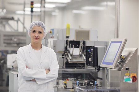 pill production - woman worker in pharmacy company warehouse Stock Photo - Budget Royalty-Free & Subscription, Code: 400-04861356