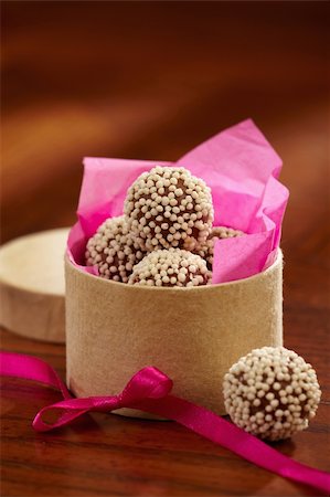 simsearch:400-07666181,k - closeup of chocolate truffles and pink ribbon Stock Photo - Budget Royalty-Free & Subscription, Code: 400-04861583