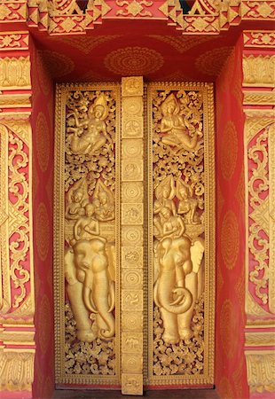 Buddhist temple door decoration in Ta-khag City, Champasak Province, Southern of Laos Stock Photo - Budget Royalty-Free & Subscription, Code: 400-04862112