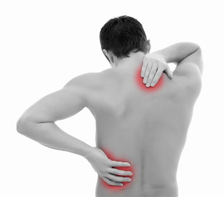 simsearch:400-06476910,k - Young man holding his back, having pain Stock Photo - Budget Royalty-Free & Subscription, Code: 400-04863473