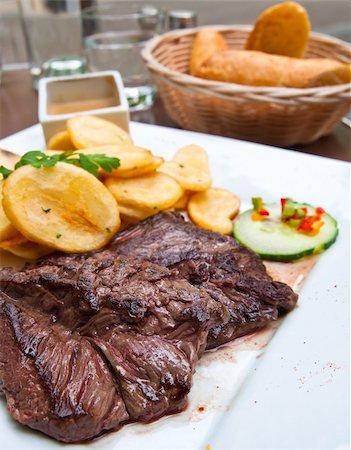 simsearch:400-05664697,k - juicy steak beef meat with tomato and potatoes Stock Photo - Budget Royalty-Free & Subscription, Code: 400-04863641