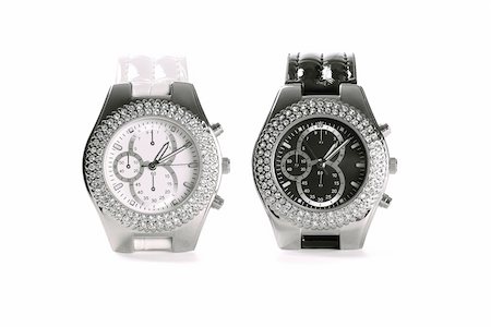 simsearch:400-04736251,k - Black and white wristwatches isolated over pure white background Stock Photo - Budget Royalty-Free & Subscription, Code: 400-04863715