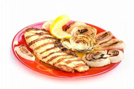 Grilled chicken breasts with onion and lemon in a plate Stock Photo - Budget Royalty-Free & Subscription, Code: 400-04863889