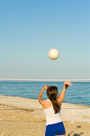 Volleyball match on a sunny Mediterranean beach Stock Photo - Budget Royalty-Free & Subscription, Code: 400-04874181