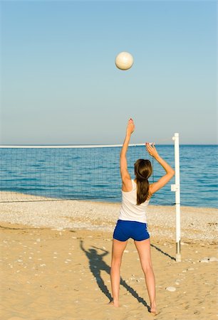 Volleyball match on a sunny Mediterranean beach Stock Photo - Budget Royalty-Free & Subscription, Code: 400-04874182