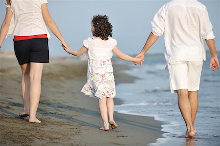 simsearch:400-05291156,k - happy young family have fun and live healthy lifestyle on beach Stock Photo - Budget Royalty-Free & Subscription, Code: 400-04874427