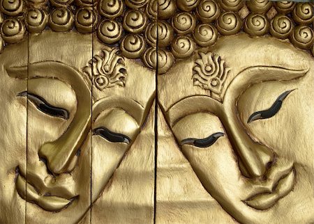Double Buddha faces carved wood gold-painted Stock Photo - Budget Royalty-Free & Subscription, Code: 400-04874950
