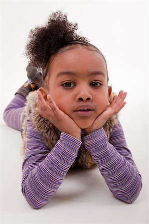 portrait of a little african american  girl Foto de stock - Super Valor sin royalties y Suscripción, Código: 400-04875141