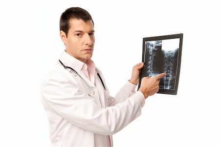 simsearch:400-04552598,k - Doctor show x-ray with stethoscope isolated on white background Foto de stock - Super Valor sin royalties y Suscripción, Código: 400-04876179