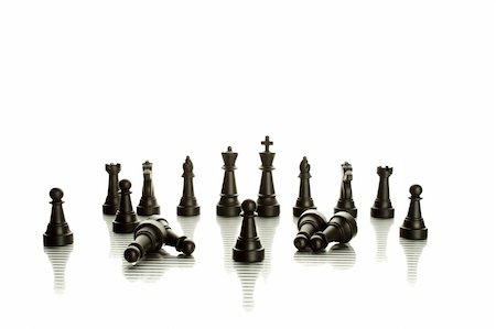 simsearch:400-04955785,k - An army of black chess pieces. Isolate on a white background Stock Photo - Budget Royalty-Free & Subscription, Code: 400-04876413