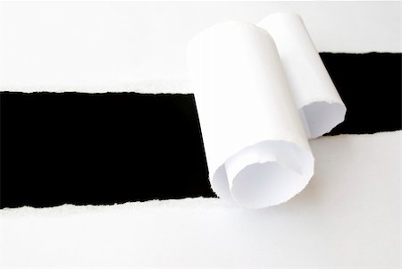 paper torn curl - torn white sheet of paper with black background and copyspace Photographie de stock - Aubaine LD & Abonnement, Code: 400-04876472