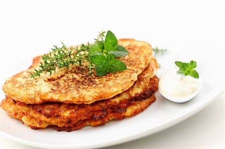 simsearch:400-06798805,k - Delicious potato pancakes with curd cheese and herbs Stock Photo - Budget Royalty-Free & Subscription, Code: 400-04876559