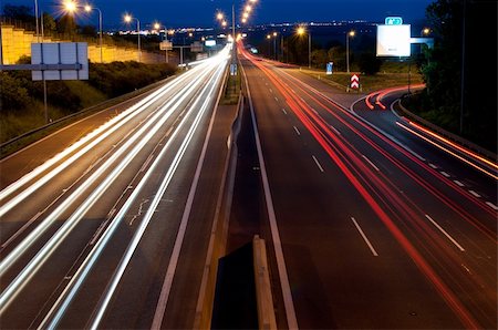 Lights on Cars in Motion on Night Highway Stock Photo - Budget Royalty-Free & Subscription, Code: 400-04876858