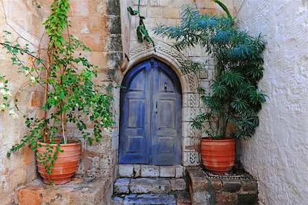 Courtyard of a Typical Greek Houses on the Island of Rhodes Stock Photo - Budget Royalty-Free & Subscription, Code: 400-04876961