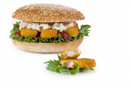 Burger with fish fingers and coleslaw salad - isolated Stockbilder - Microstock & Abonnement, Bildnummer: 400-04877182