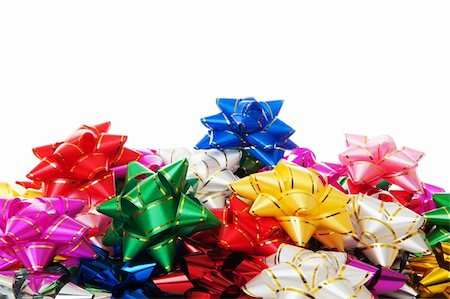 simsearch:400-04300855,k - Heap of the colorful decorative bows isolated over white background Foto de stock - Super Valor sin royalties y Suscripción, Código: 400-04877416