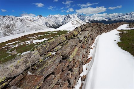 ssnowball (artist) - A trench of the first global war near Pagano Peak. 2348 meters on the sea-level, after a spring snowfall. Brixia province, Lombardy region, Italy Foto de stock - Super Valor sin royalties y Suscripción, Código: 400-04877422