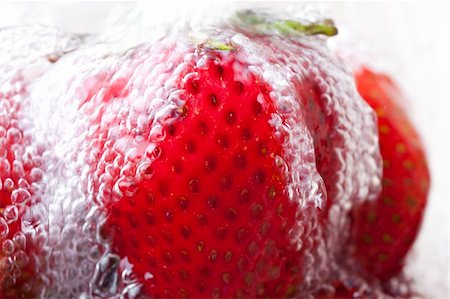 simsearch:400-05686207,k - Fresh red strawberries being washed Stock Photo - Budget Royalty-Free & Subscription, Code: 400-04877905