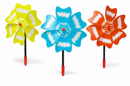 simsearch:400-04815627,k - Three colorful toy windmills on white background Fotografie stock - Microstock e Abbonamento, Codice: 400-04878335