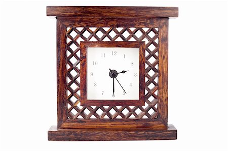 Clock in carved wood frame isolated on white Stock Photo - Budget Royalty-Free & Subscription, Code: 400-04878442