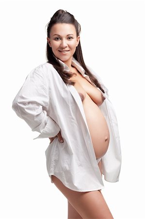 Beautiful young pregnant woman, isolated on white Stockbilder - Microstock & Abonnement, Bildnummer: 400-04878879