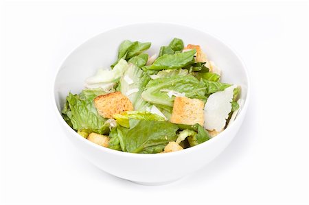 salada caesar - A green salad with croutons and cheese Foto de stock - Royalty-Free Super Valor e Assinatura, Número: 400-04879197