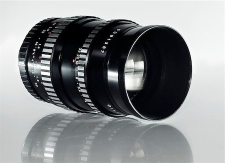 analogue zoom lens on a glossy surface Stock Photo - Budget Royalty-Free & Subscription, Code: 400-04879604