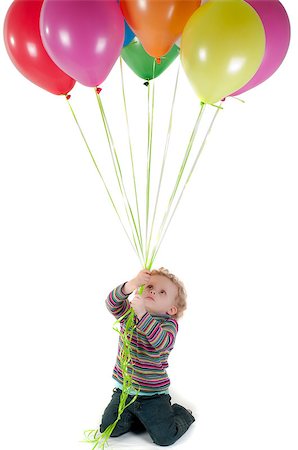 simsearch:400-04690017,k - Shot of little cute girl with multicolored air balloons isolated on white Foto de stock - Super Valor sin royalties y Suscripción, Código: 400-04879954