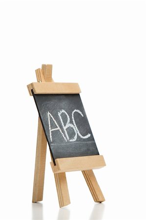 simsearch:400-07971845,k - Angled chalkboard with the letters abc written on it isolated against a white background Stock Photo - Budget Royalty-Free & Subscription, Code: 400-04870121