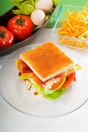 potato salad yellow - fresh and delicious classic club sandwich over a transparent glass dish Stock Photo - Budget Royalty-Free & Subscription, Code: 400-04870319