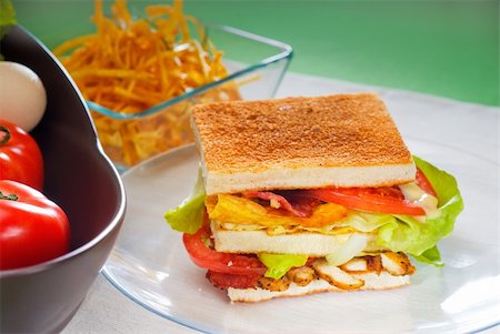 simsearch:400-04798472,k - fresh and delicious classic club sandwich over a transparent glass dish Stock Photo - Budget Royalty-Free & Subscription, Code: 400-04870320
