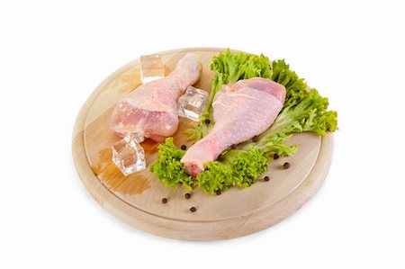 simsearch:400-08222506,k - Fresh and frozen chicken legs, isolated on white background, with clipping path Stock Photo - Budget Royalty-Free & Subscription, Code: 400-04870344