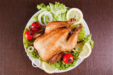 simsearch:400-07826555,k - Roast chicken with fresh vegetables, studio shot Fotografie stock - Microstock e Abbonamento, Codice: 400-04870347