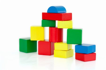 Wooden building blocks on a white background Stock Photo - Budget Royalty-Free & Subscription, Code: 400-04870363