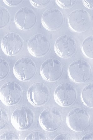 simsearch:400-04883457,k - Close up of air bubble wrap sheet background Foto de stock - Royalty-Free Super Valor e Assinatura, Número: 400-04871044