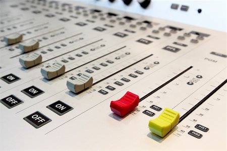 equalizer - Sound mixer, low angle shot with shallow DOF, useful for various music and sound themes Stockbilder - Microstock & Abonnement, Bildnummer: 400-04872611