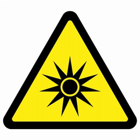 danger pictograms - This symbol indicates the presence of an optical radiation hazard Stock Photo - Budget Royalty-Free & Subscription, Code: 400-04872651