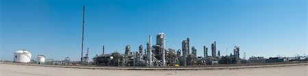distilling - panorama shot of an oil refinery at the rotterdam harbor Stock Photo - Budget Royalty-Free & Subscription, Code: 400-04873011