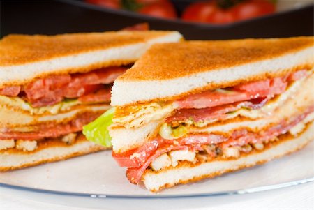 simsearch:400-07179775,k - fresh and delicious classic club sandwich over a transparent glass dish Stock Photo - Budget Royalty-Free & Subscription, Code: 400-04873200