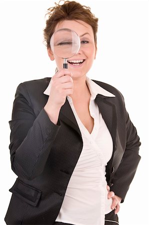 simsearch:400-05142003,k - Attractive smiling business woman looking into a magnifying glass isolated Photographie de stock - Aubaine LD & Abonnement, Code: 400-04873470